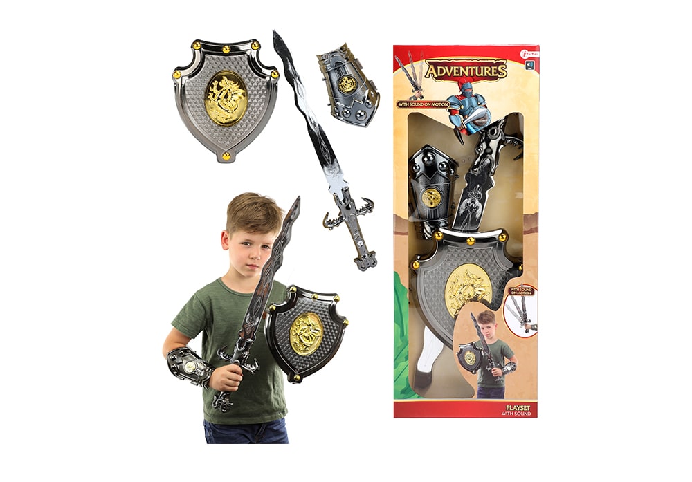 Verpakking met zwaard, schild en armbeschermer plus kindmodel met Toi-Toys ridder verkleedset